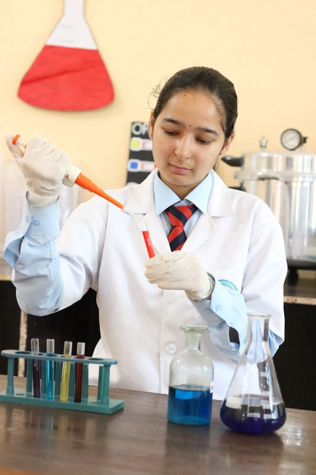 BMLT student pipetting in the pathology laboratory